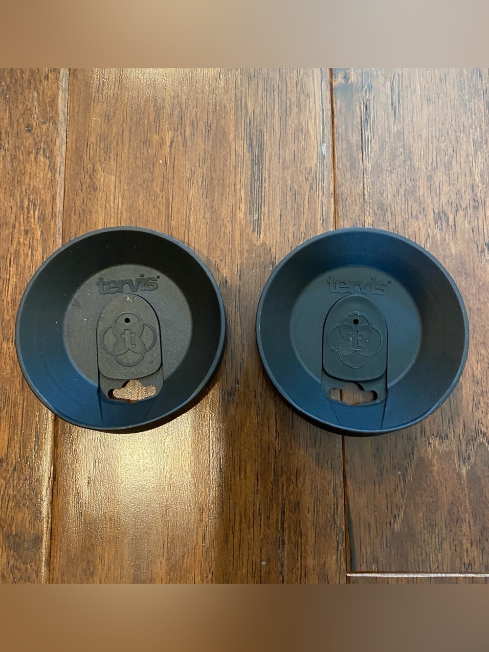 2 black Tervis lids